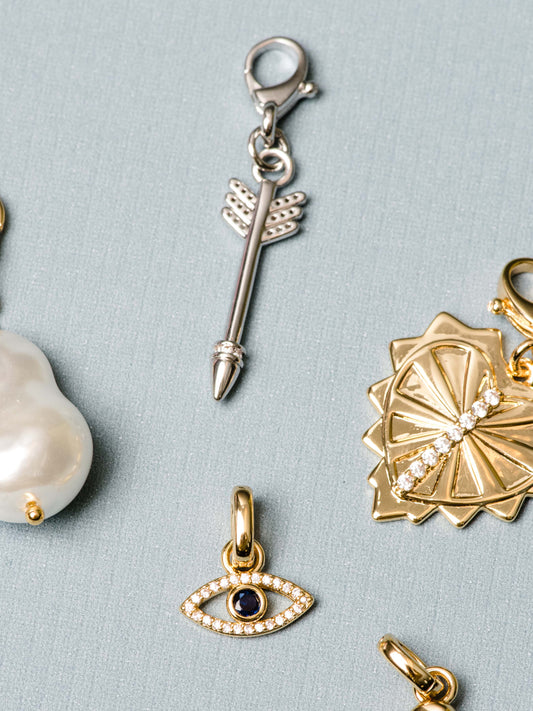 Arrow Charm | Silver | Flatlay Image | Uncommon James