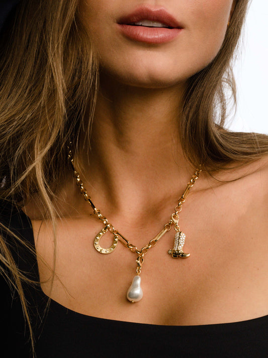 Horseshoe Charm | Gold | Model Image | Uncommon James