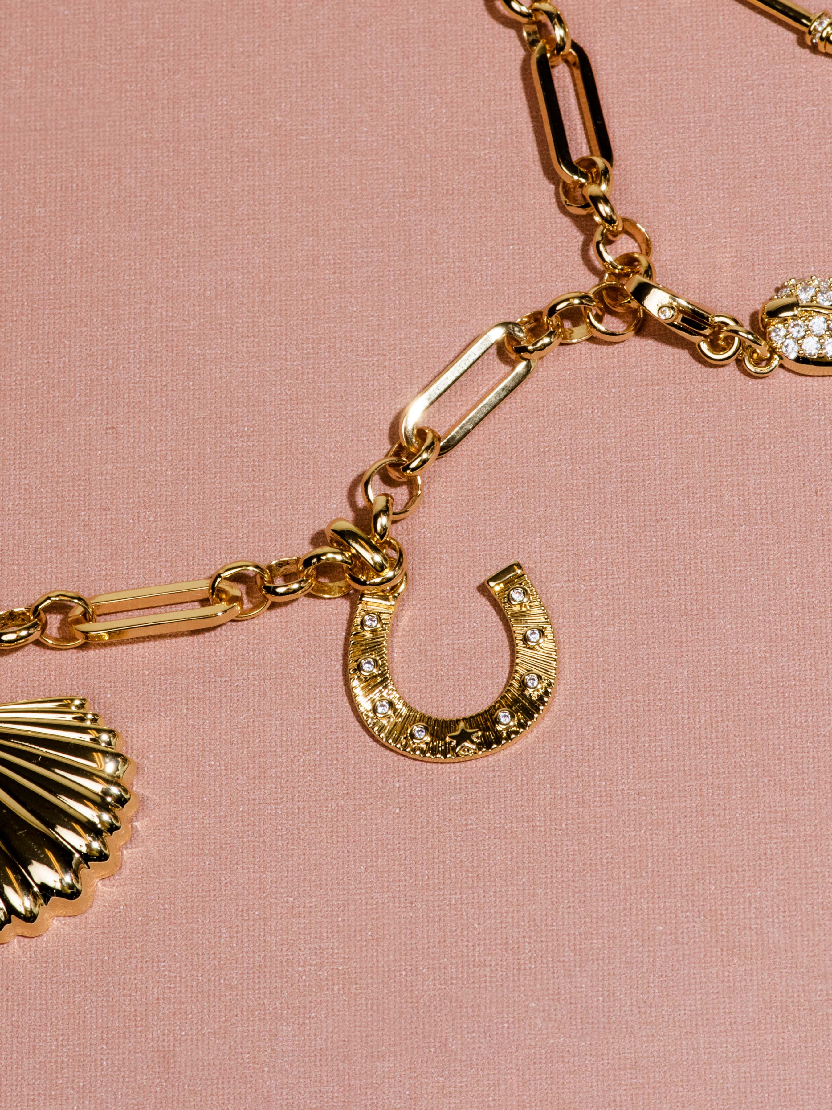 Horseshoe Charm in Gold and Silver | Charm Jewelry | Uncommon James