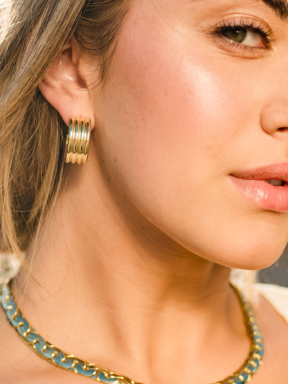 ["Art Deco Hoop Earrings ", " Gold ", " Campaign Image ", " Uncommon James"]