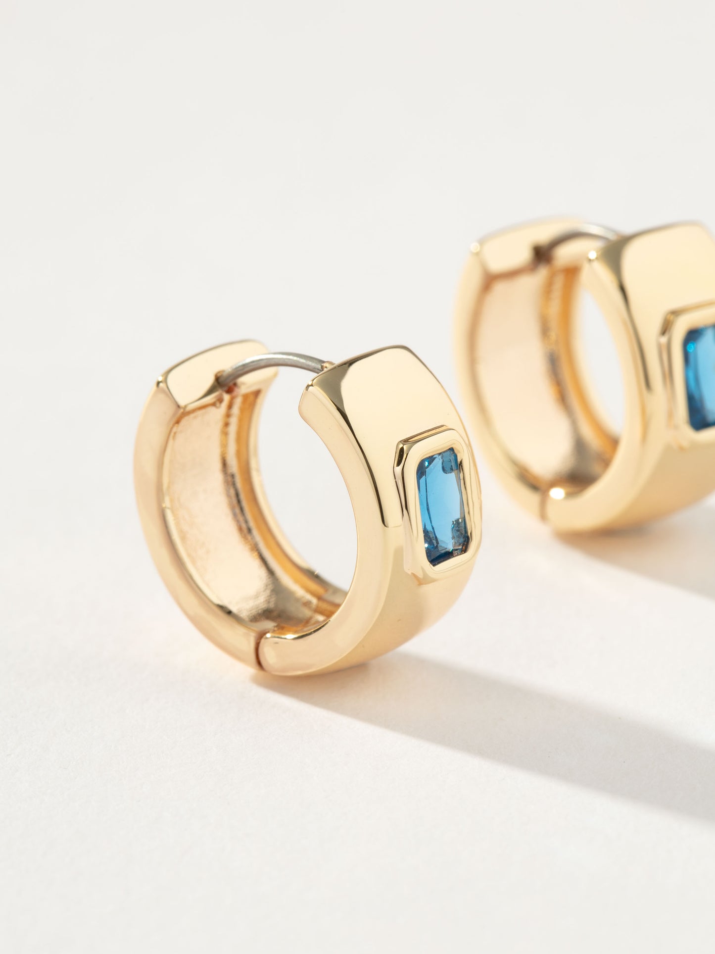 Chunky Birthstone Huggie Earrings | Gold December | Product Detail Image | Uncommon James
