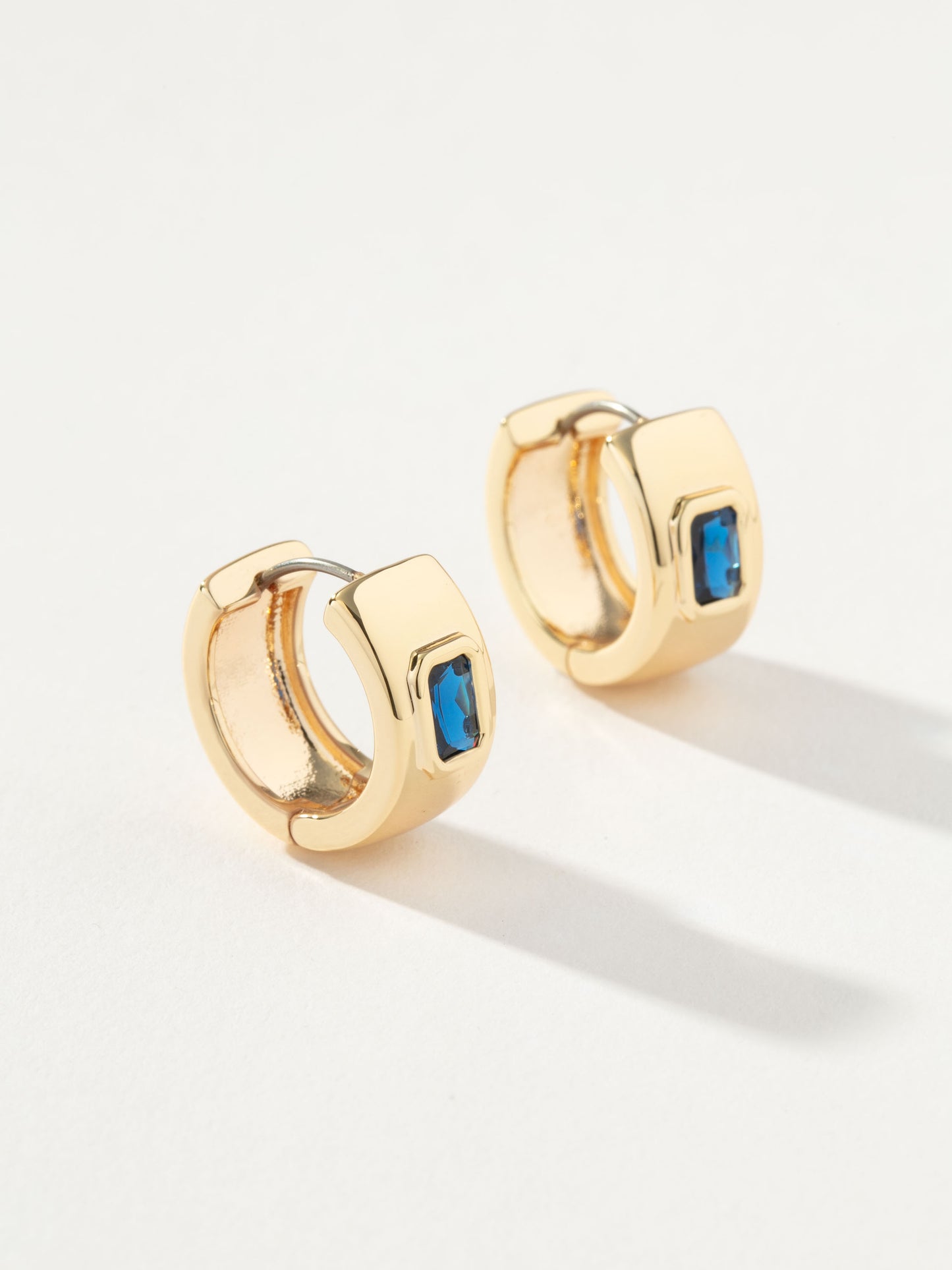 Chunky Birthstone Huggie Earrings | Gold September | Product Detail Image | Uncommon James