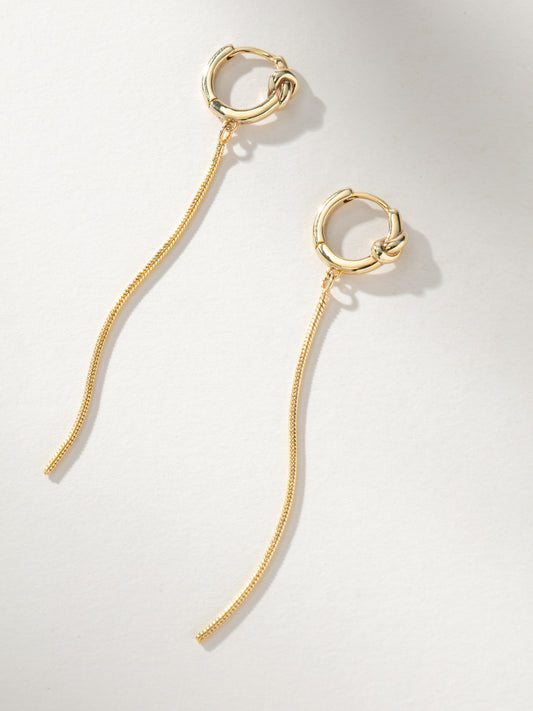 Forever Knot and Chain Huggie Earrings | Gold | Model Image | Uncommon James