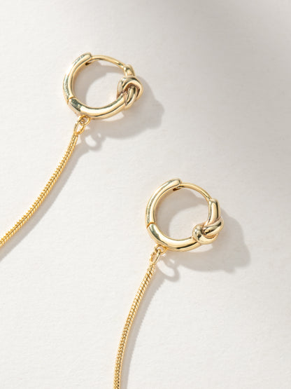 ["Forever Knot and Chain Huggie Earrings ", " Gold ", " Product Image ", " Uncommon James"]