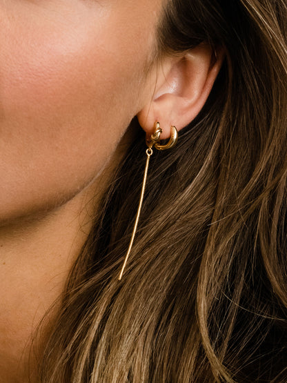 ["Forever Knot and Chain Huggie Earrings ", " Gold ", " Model Image ", " Uncommon James"]