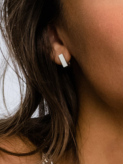 ["Passion Square Huggie Earrings ", " Silver ", " Model Image ", " Uncommon James"]