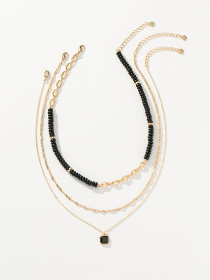 ["Chateau Layered Necklace ", " Black ", " Product Image ", " Uncommon James"]