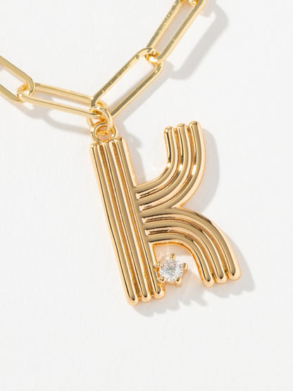 ["Muse Initial Layered Necklace ", " Gold K ", " Product Image ", " Uncommon James"]