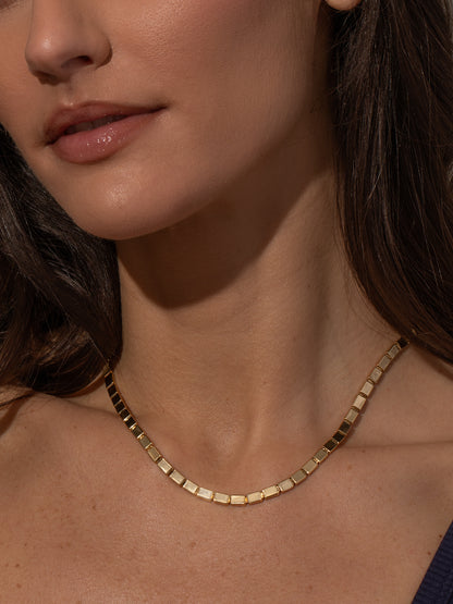 ["Wanderlust Necklace ", " Gold ", " Model Image ", " Uncommon James"]