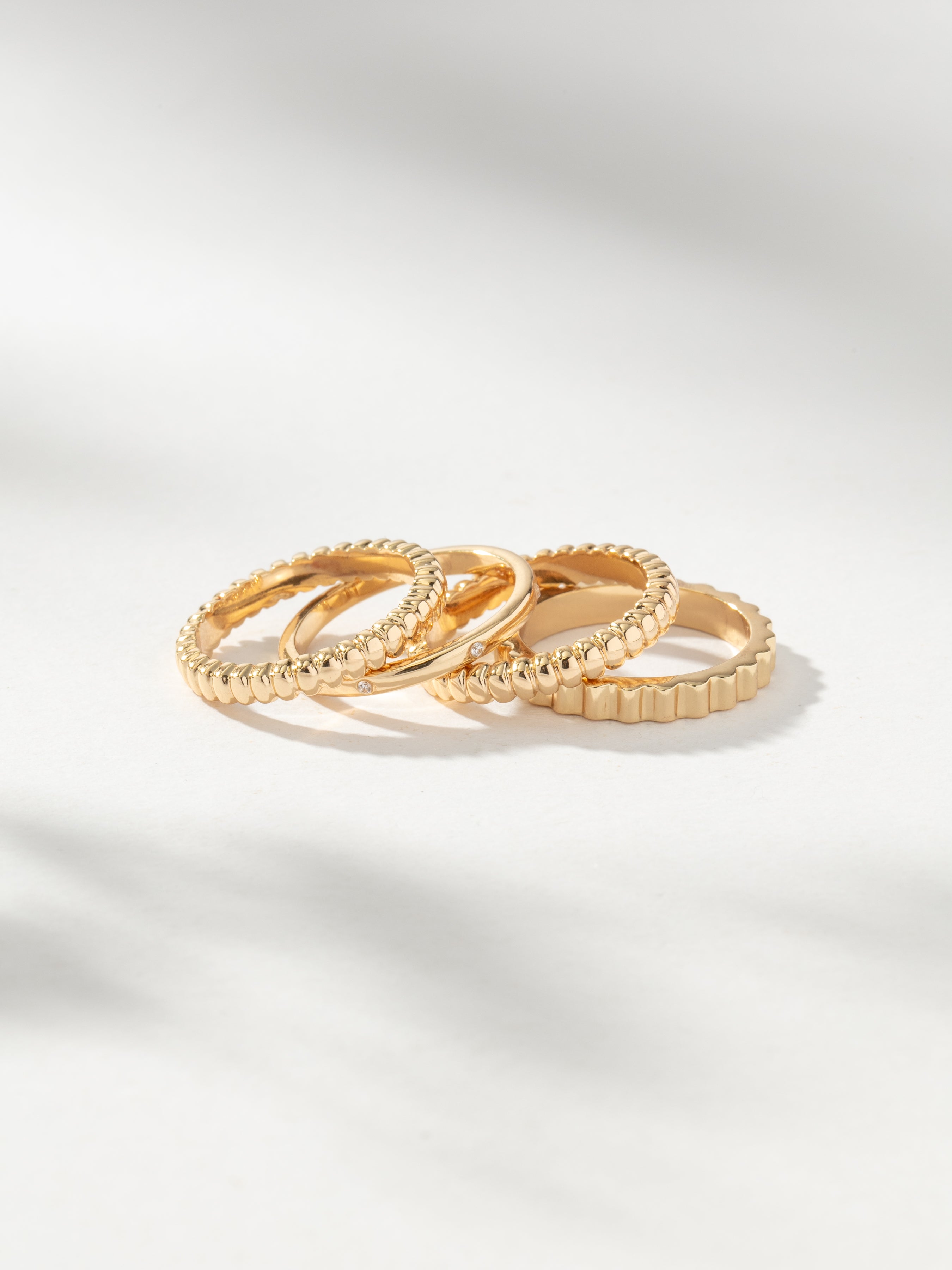High Tide Ring Set of 4 | Gold Ring Stack | Uncommon James