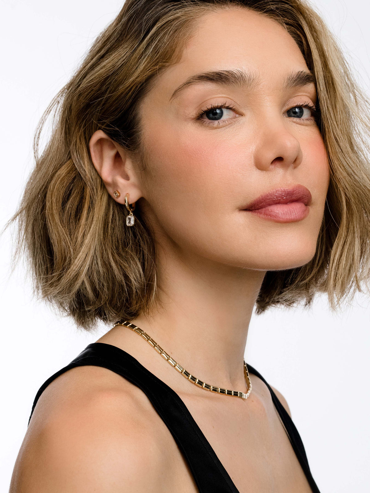 Emerald Stud Earrings | Gold Small | Model Image 2 | Uncommon James