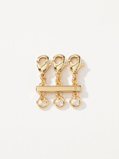 ["Layering Clasp ", " Gold ", " Product Image ", " Uncommon James"]