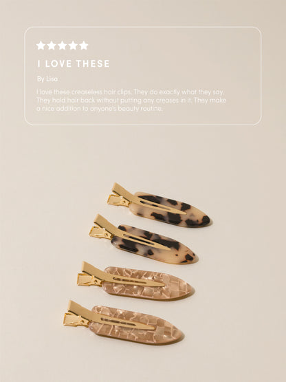 ["No Crease Hair Clips ", " Brown ", " Review Image ", " Uncommon Beauty ", " I love these By Lisa I love these creaseless hair clips. They do exactly what they say. They hold hair back without putting any creases in it. They make a nice addition to anyone's beauty routine. "]
