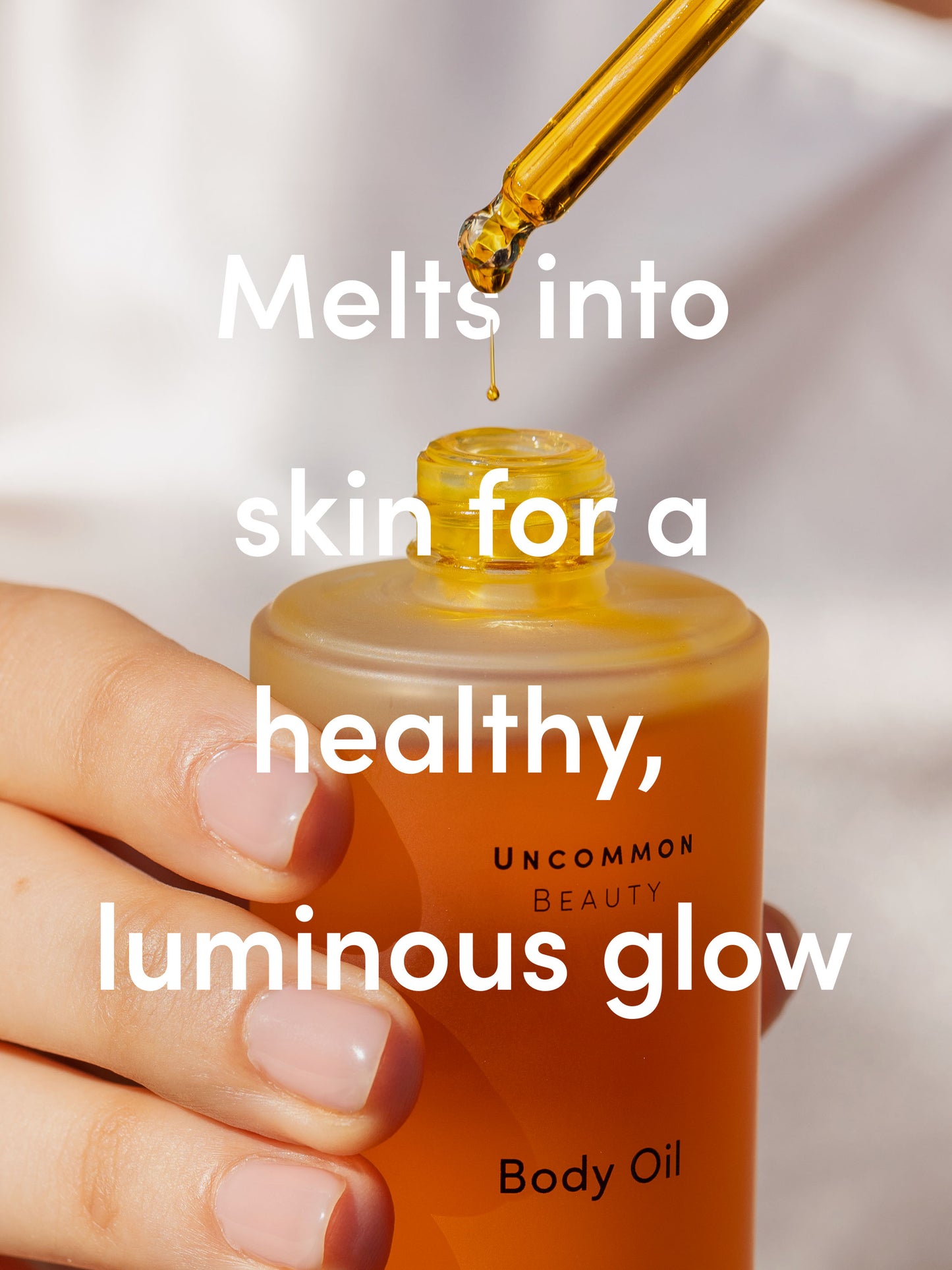 Body Oil | 100 ml / 3.38 fl oz | Product Detail Image | Uncommon Beauty | Melts into skin for a healthy, luminous glow