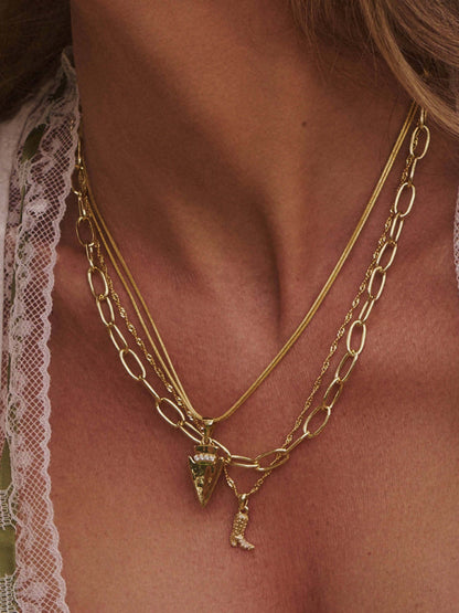 ["Out West Necklace Stack ", " Gold ", " Campaign Image ", " Uncommon James"]