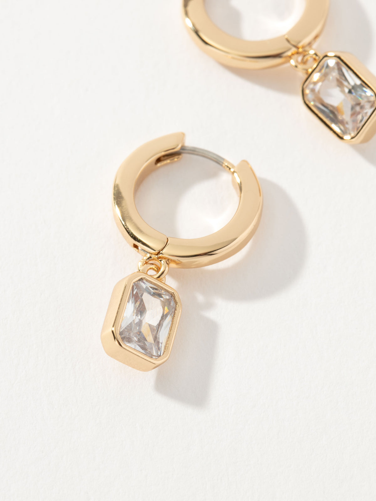 Emerald Huggie Earrings | Gold | Product Image | Uncommon James