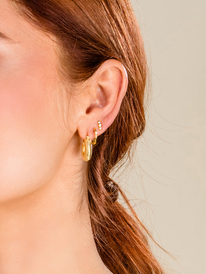 ["Triple Diamond Vermeil Stud Earrings ", " Gold Vermeil ", " Campaign Image ", " Uncommon James"]