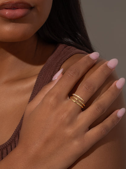 ["Vermeil Minimal Glam Spiral Ring ", " Gold Vermeil ", " Model Image ", " Uncommon James"]