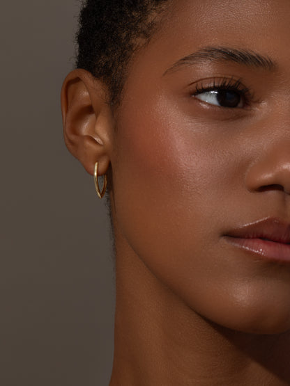 ["Vermeil Chic Hoop Earrings ", " Gold ", " Model Image ", " Uncommon James"]