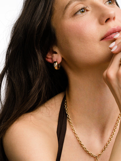 ["Chunky Birthstone Huggie Earrings ", " Gold ", " Group Image ", " Uncommon James"]