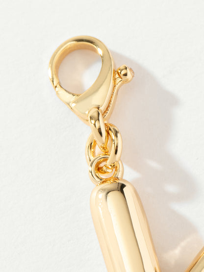 ["Arrow Charm ", " Silver ", " Product Image ", " Uncommon James"]