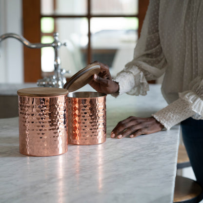 ["Hammered Copper Canisters Large ", " Lifestyle Image ", " Uncommon James Home"]