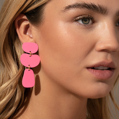 Nudist Earrings | Hot Pink Gold | Model Image | Uncommon James