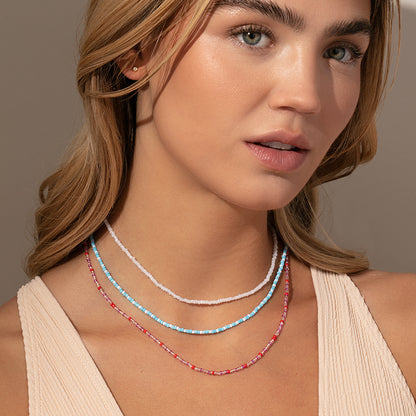 ["Beaded Necklace ", " Blue White Mid ", " Model Image 3 ", " Uncommon James"]
