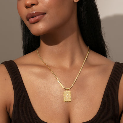 ["Letter Chain Necklace ", " Gold ", " Model Image ", " Uncommon James"]