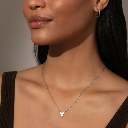 Mini White Heart Necklace | Sterling Silver | Model Image | Uncommon James